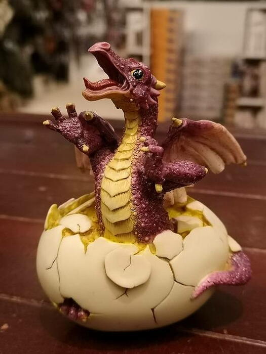 Violet Dragon hatching from egg